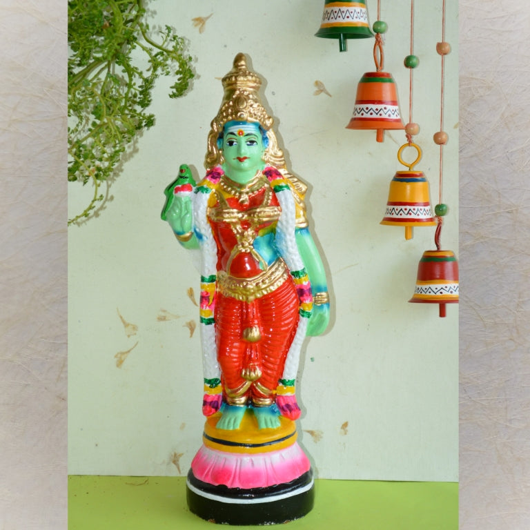 Handcrafted Meenakshi figurine in a red saree, holding a parrot, with intricate detailing for Navaratri Golu displays.