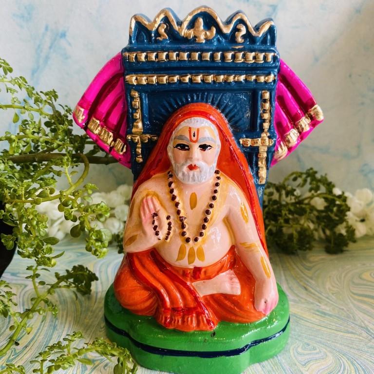 Handcrafted Saint Raghavendra clay figurine for Navaratri Golu and home decor.