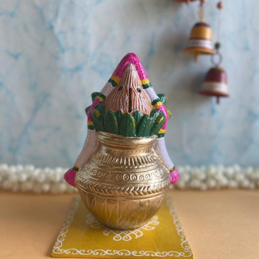 Handcrafted medium-sized traditional Kalasam idol with a golden pot, green leaves, and festive detailing for Navaratri Golu.