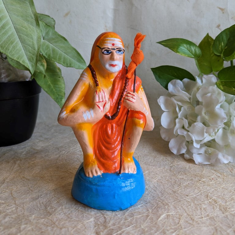 Handcrafted Kanchi Periyavar small figurine depicting the revered spiritual leader with intricate detailing for Navaratri Golu.