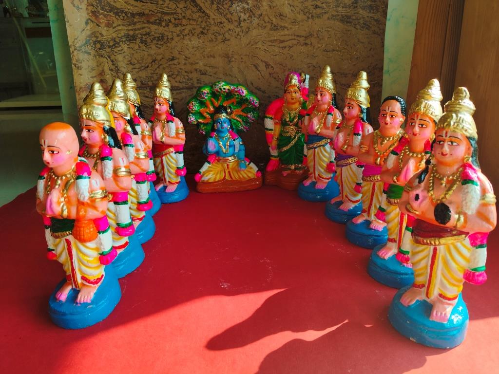 Handcrafted Alwar Saints Navaratri Golu Doll Set featuring the 12 Alwar saints, Lord Vishnu, and Goddess Lakshmi in vibrant colors and intricate detailing.