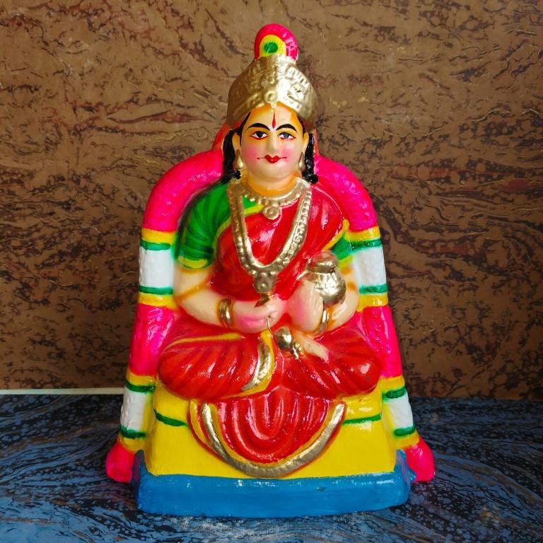 Handcrafted Goddess Annapoorani Navaratri Golu Doll with vibrant colors and intricate details, symbolizing prosperity and nourishment.