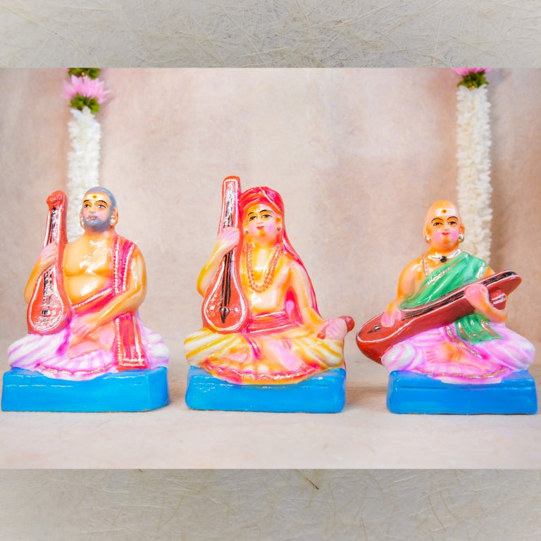 Handcrafted Navarathri Golu doll set of Sangeetha Mummoorthigal (The Musical Trinity) - Thyagaraja, Muthuswami Dikshitar, and Syama Sastri with veenas.