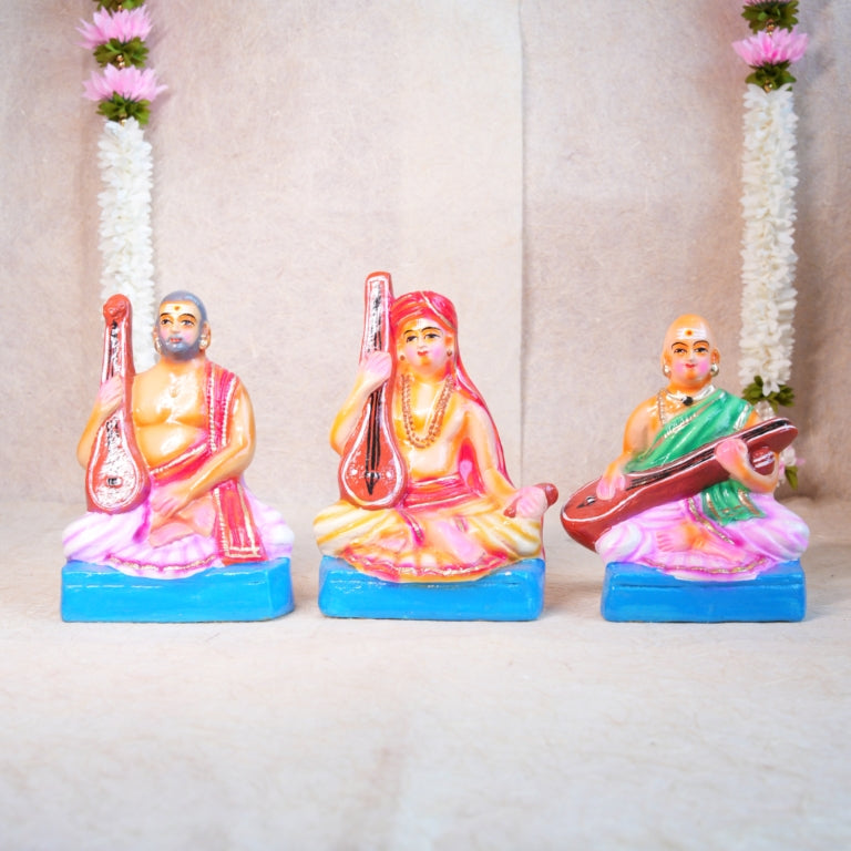 Handcrafted Navarathri Golu doll set of Sangeetha Mummoorthigal (The Musical Trinity) - Thyagaraja, Muthuswami Dikshitar, and Syama Sastri with veenas.