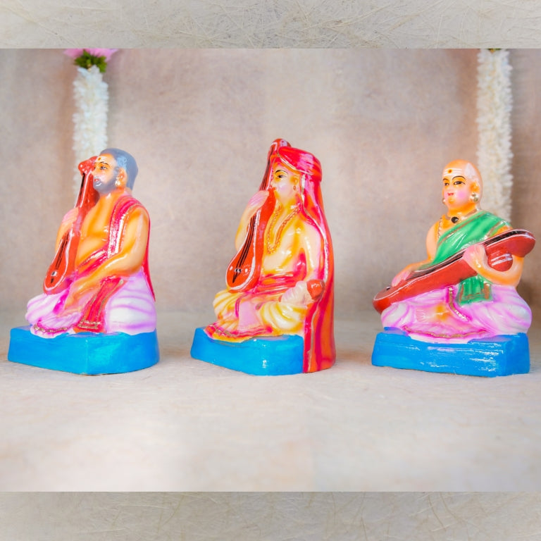 Handcrafted Navarathri Golu doll set of Sangeetha Mummoorthigal (The Musical Trinity) - Thyagaraja, Muthuswami Dikshitar, and Syama Sastri with veenas.