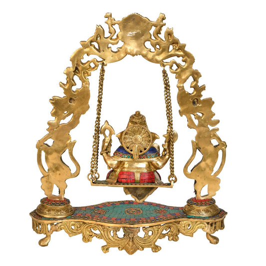 Ganesha Statue On Swing With Inlay Work – Handcrafted Brass And Stone Inlay Artwork