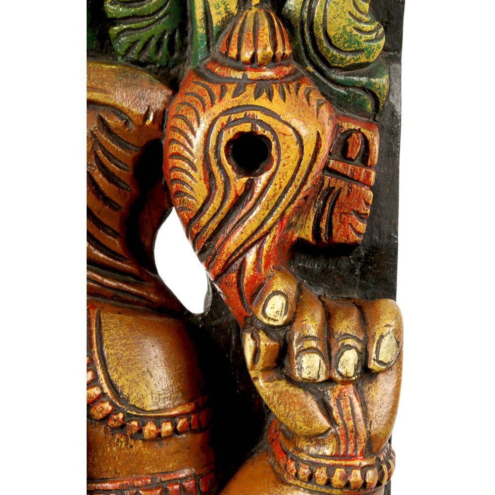 Lotus-Seated Ganesha Enshrining Prabhavali – Handcrafted Wooden Statue With Vibrant Detailing