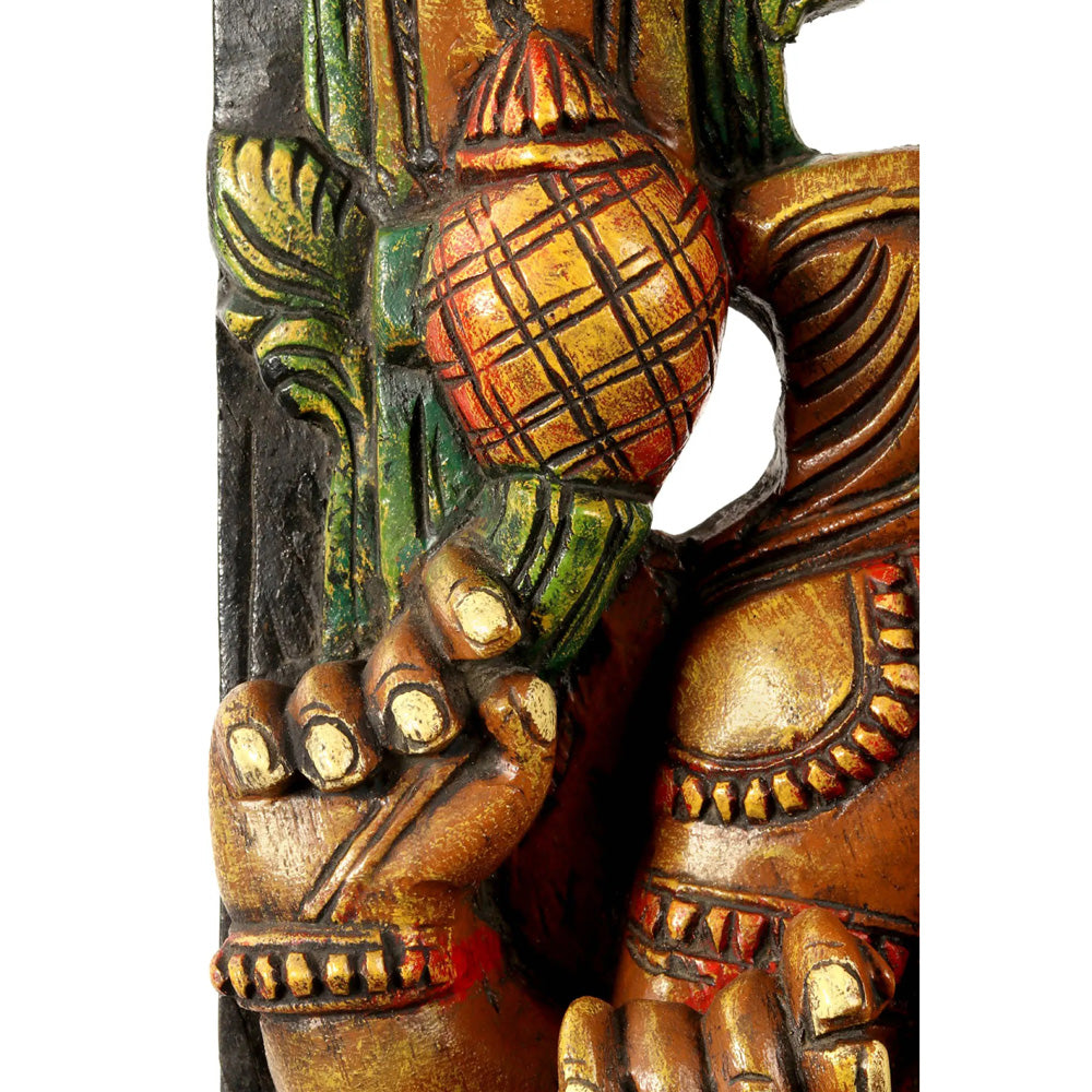 Lotus-Seated Ganesha Enshrining Prabhavali – Handcrafted Wooden Statue With Vibrant Detailing