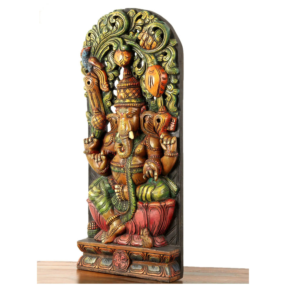 Lotus-Seated Ganesha Enshrining Prabhavali – Handcrafted Wooden Statue With Vibrant Detailing