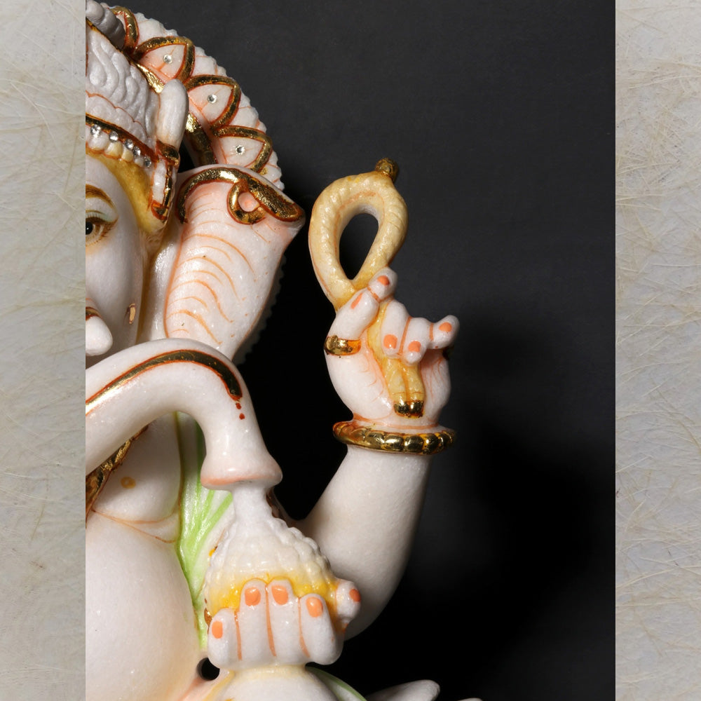 Lord Ganesha Seated On Lotus – Handcrafted Marble Statue With Gold Detailing