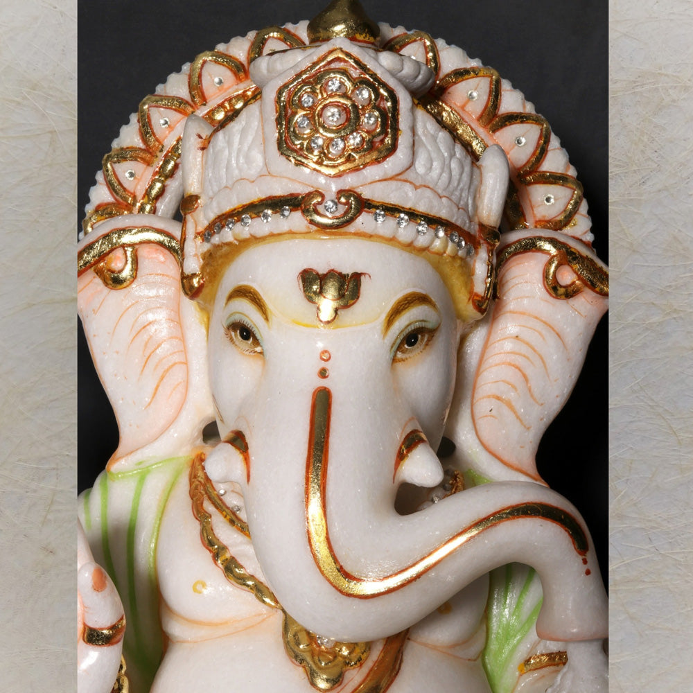 Lord Ganesha Seated On Lotus – Handcrafted Marble Statue With Gold Detailing