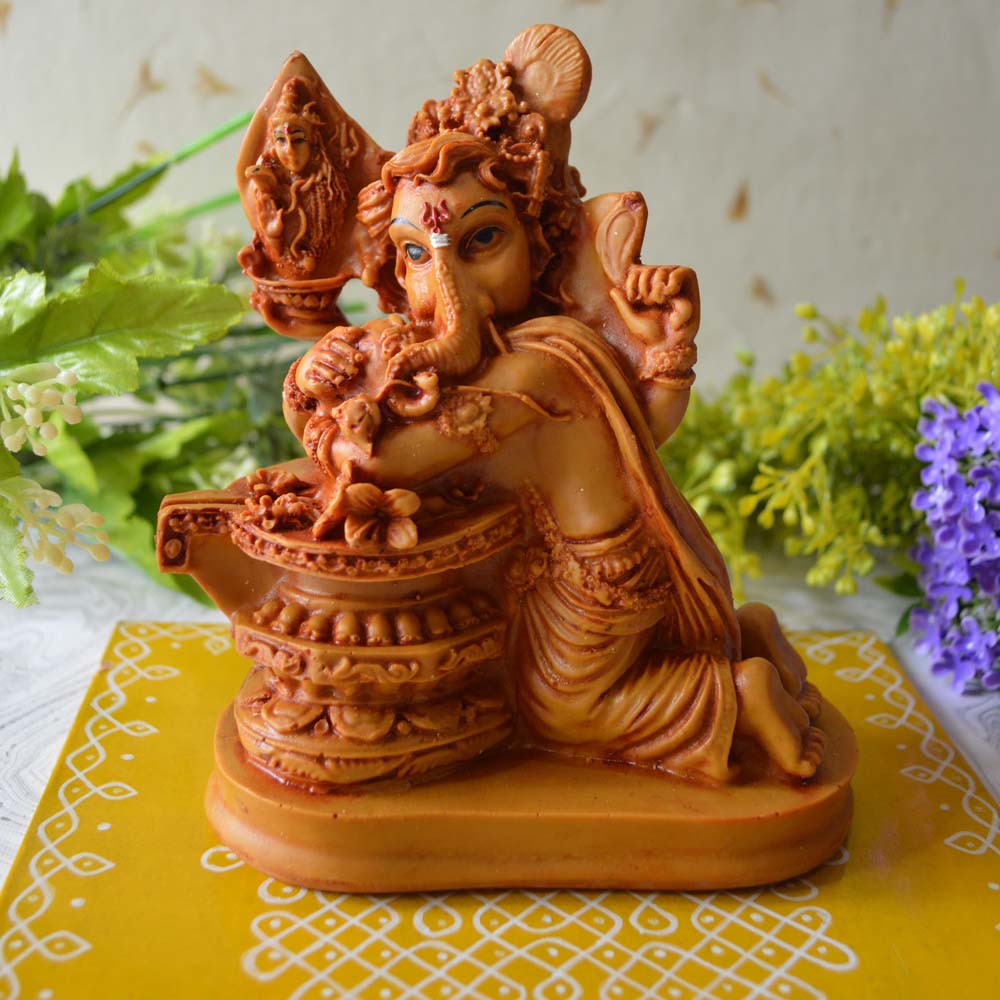 Handcrafted Chandan Shiva Ganesh idol with intricate detailing, symbolizing divine harmony and grace.