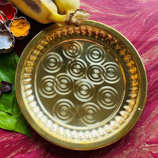 Eternal Plate Laser Circles 7 in brass with engraved spiral design.