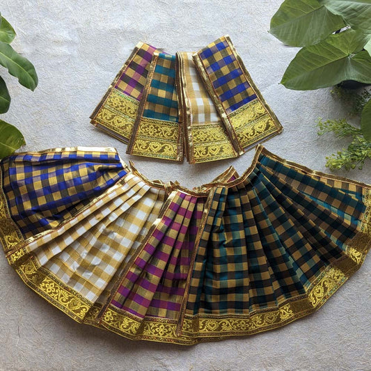 A collection of checked Devi skirts with golden borders in vibrant colors, perfect for decorating deity idols and ceremonial decorations.