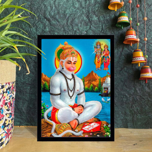 Lord Hanuman seated in meditation with Lord Ram and Sita in the background, framed spiritual wall décor.