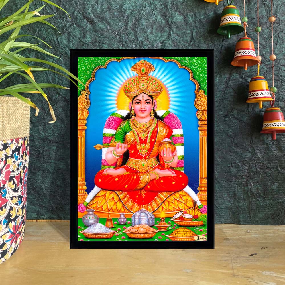 Framed art print of Goddess Annapoorani seated with food offerings, vibrant colors, and detailed design.