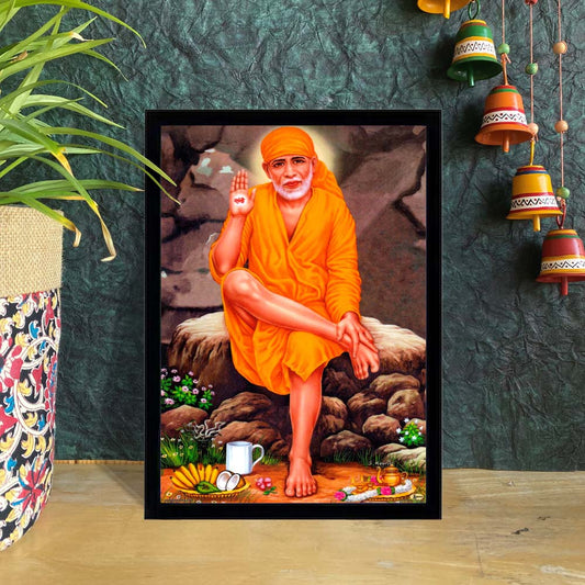 Sai Baba seated on a rock, wearing orange robes, blessing devotees with a serene and natural backdrop.