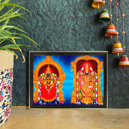 Framed artwork of Lord Venkateshwara (Perumal) and Goddess Padmavathi (Thayar) with golden temple arches and a serene blue background.