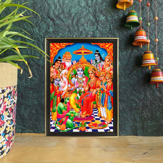 Framed artwork of Lord Rama's coronation (Pattabhishekam) with Goddess Sita, Hanuman, Lakshmana, and sages in a divine setting.