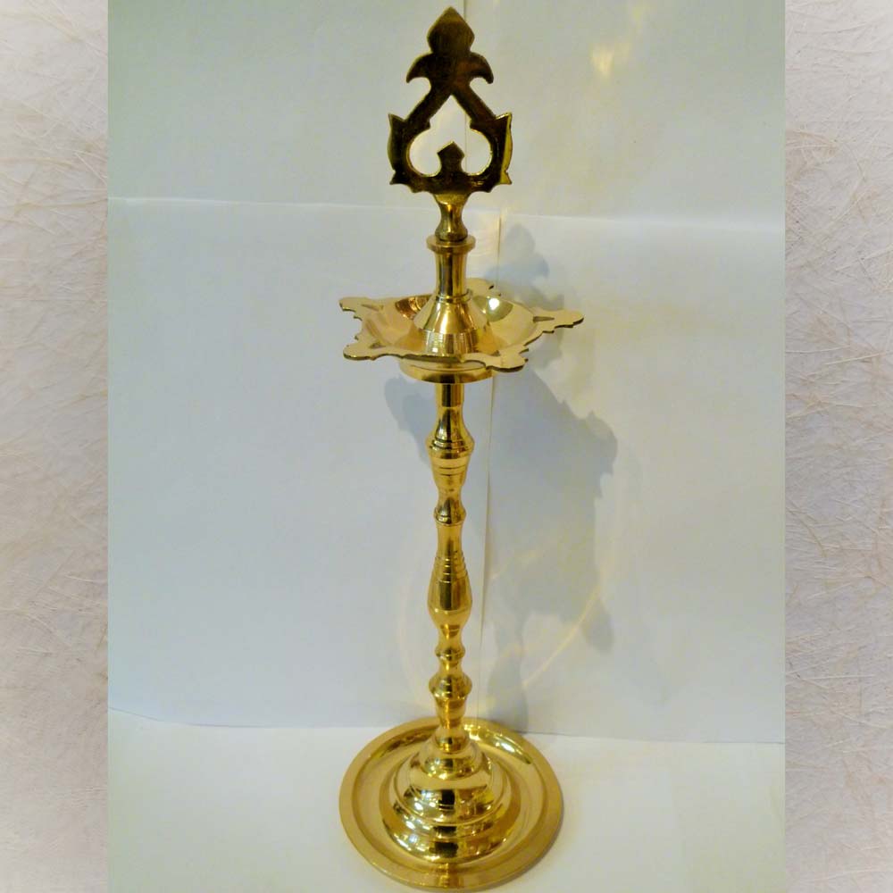 Eternal Chandravali Kuthu Vilakku tall brass oil lamp with traditional South Indian design and elegant detailing.