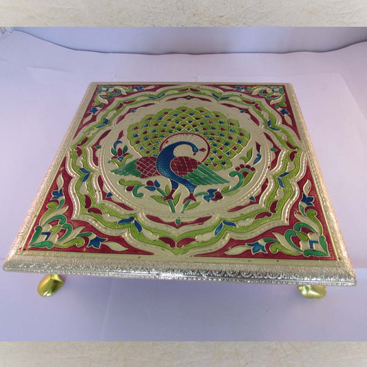 Golden Meenakari Peacock Stool with vibrant red, green, and blue designs, perfect for pooja spaces or as home decor.