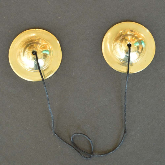 Brass Eternal Cymbals with cord, used in Hindu pooja ceremonies and rituals, producing melodic sounds.